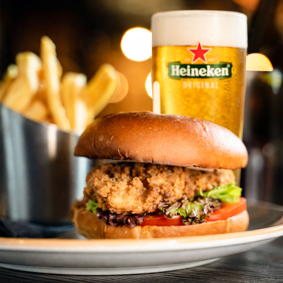 Graphic promoting the midweek burger and pint deal at The Old Quarter: any burger and any pint for €20, available Tuesday to Thursday in Limerick.