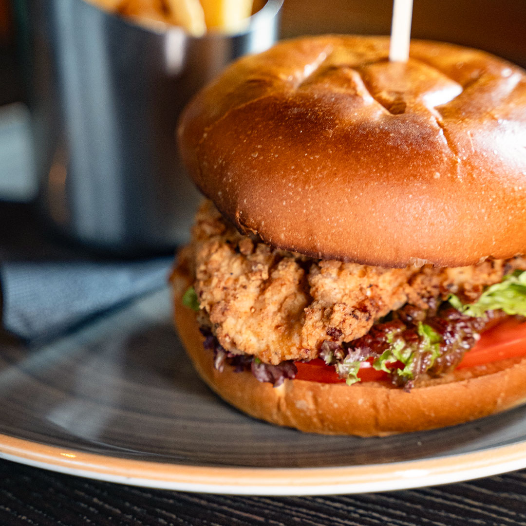 Graphic promoting the midweek burger and pint deal at The Old Quarter: any burger and any pint for €20, available Tuesday to Thursday in Limerick.