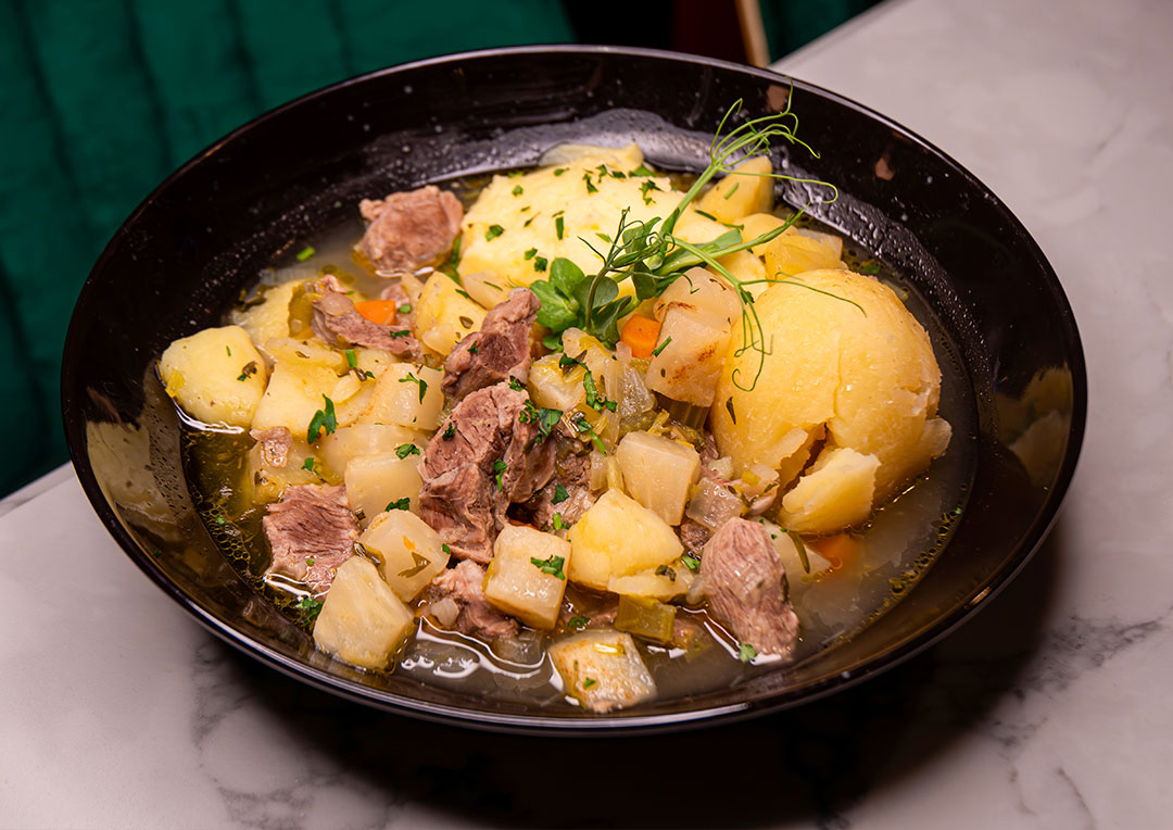 Graphic promoting March Special dish at The Old Quarter, Traditional Irish Lamb Stew. A comforting classic packed with rich flavour and perfect for the season.