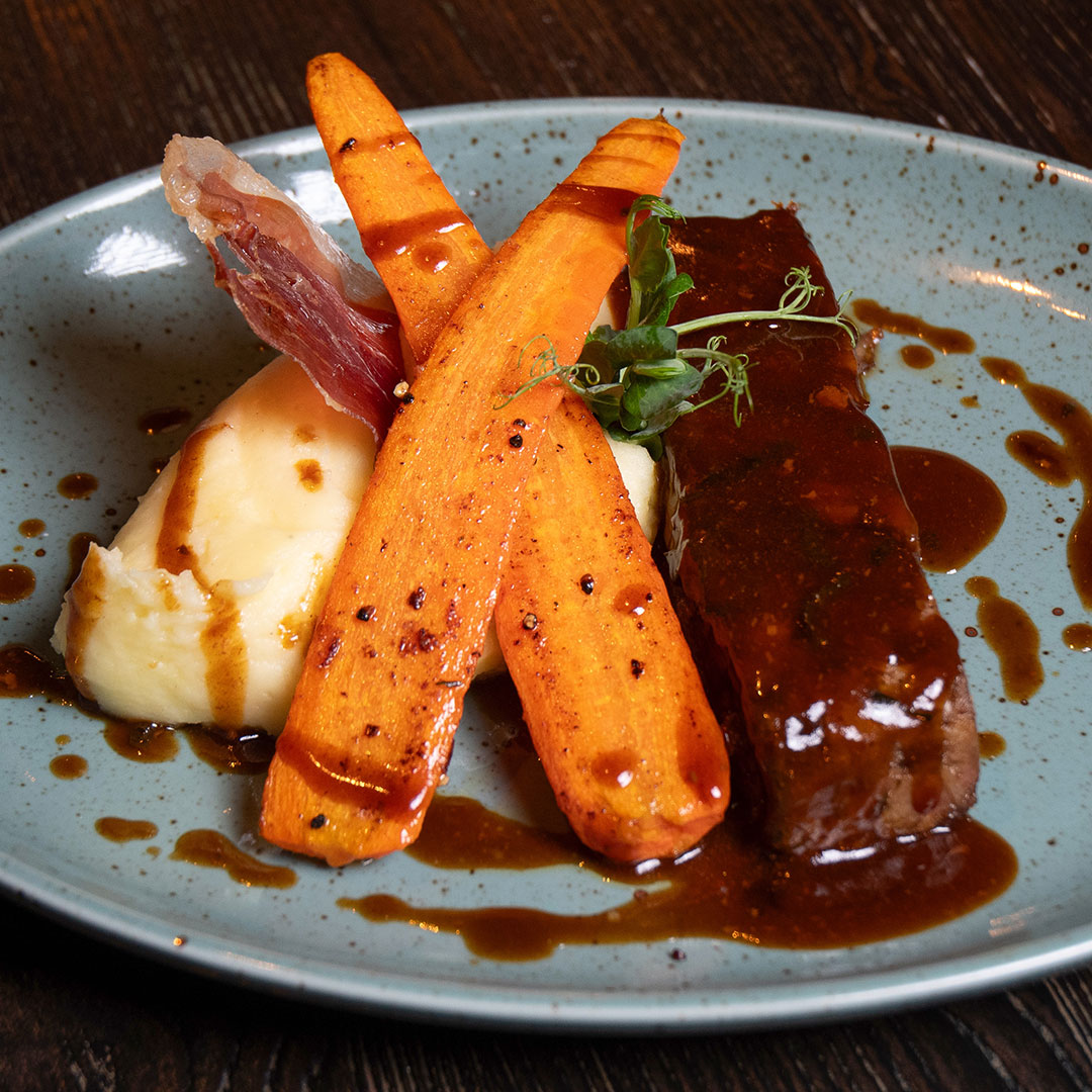 April Special dish: 12 Hour Slow Braised Lamb Shoulder, served with Mash, Roasted Carrots and Mint flavour Gravy. Only available in April at The Old Quarter.