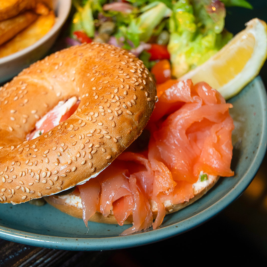 Good Friday Special dish: Cream Cheese & Smoked Salmon Bagel, served with Side Salad and Potato Wedges. Only available on Good Friday at The Old Quarter.