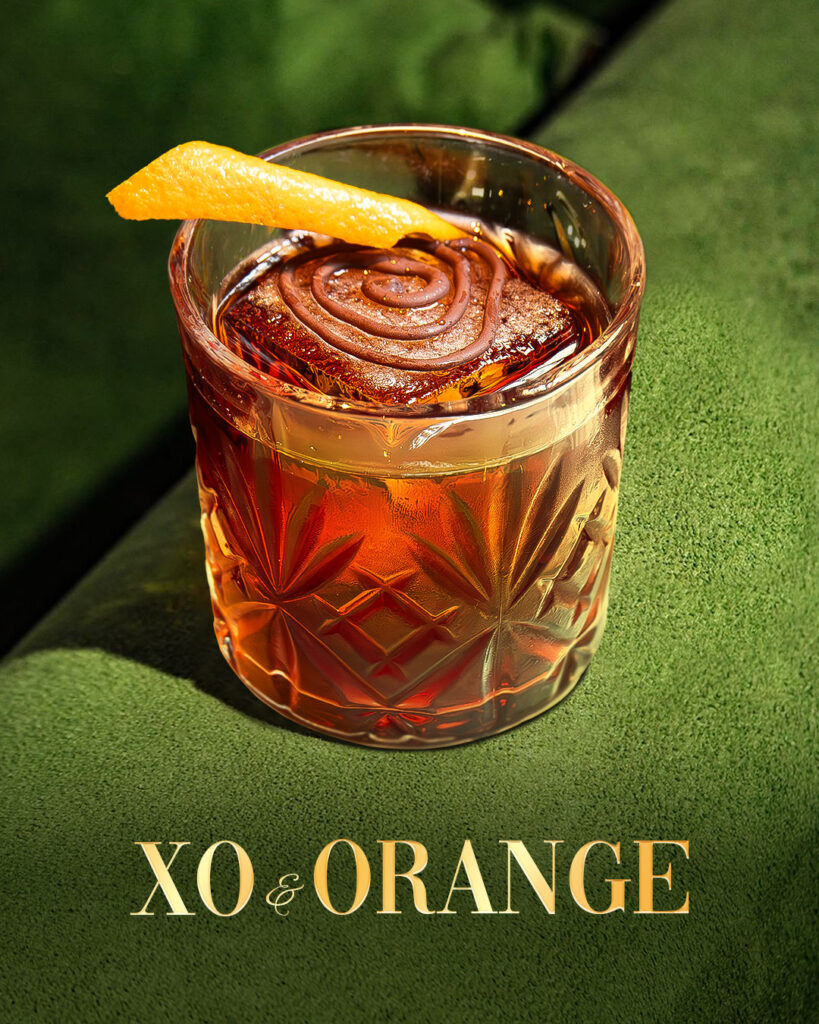 Graphic promoting April Cocktail of The Month, XO & Orange, creating to Easter at The Old Quarter in Limerick.