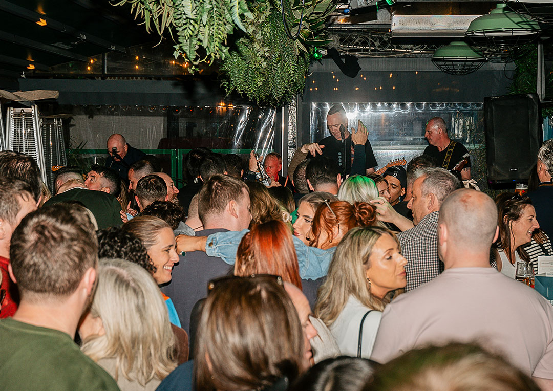 Graphic showcasing people enjoying Riverfest at The Old Quarter, one of the best spots for live music, food, drinks in Limerick city centre.